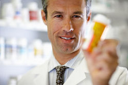 pharmacist_holding_bottle