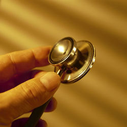 healthhand_holding_stethoscope